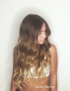 Brunette to blonde balayage with beach waves by Leslie Shores, Nashville hair colorist