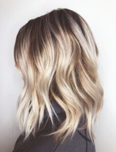 Bright blonde balayage with shadow root by Leslie Shores, Nashville colorist.