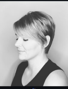 Textured razor-cut pixie with a swept side fringe by Rebecca Erickson, Nashville, TN hairstylist