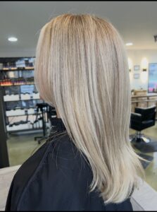 Bright blonde highlights with smooth straight finish by Alyssa Black, Nashville hairstylist.