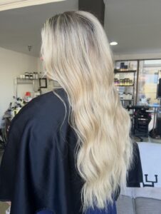 Extra long platinum blonde with soft waves by Alyssa Black, Nashville hairstylist