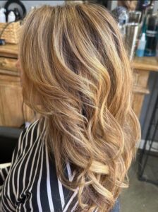 Warm caramel blonde balayage styled in long, full curls by Tami Whiteside, Nashville, TN hairstylist