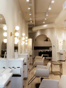 Bright, modern salon styling stations at Annie Miller's salon in Franklin, TN