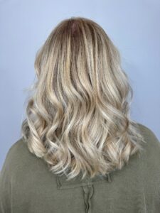Blonde with a soft root melt styled in loose curls by Gabby Allen, Lebanon, TN hairstylist