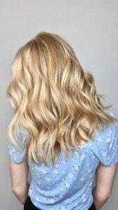 Golden honey blonde all-over color with soft waves by Gabby Allen, Lebanon, TN hairstylist
